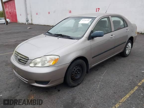 2003 Toyota Corolla CE z VIN 1NXBR32E03Z143788, wystawiony jako IAAI lot #43316766 z przebiegiem 299 999 mil mil oraz . Historia ofert i sprzedaży dostępna na DreamBid. Obrazek 2.