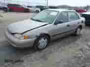 1999 Chevrolet Prizm z VIN 1Y1SK5488XZ446950, wystawiony jako IAAI lot #41798129 z przebiegiem 292 798 mil mil oraz . Historia ofert i sprzedaży dostępna na DreamBid. Obrazek 2.