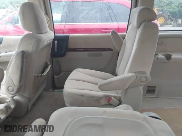 2007 Hyundai Entourage GLS with VIN KNDMC233676013319, listed as a IAAI auction lot 42663094 with 209,578 mi miles and . Bid and sale history available at DreamBid. Image 8.