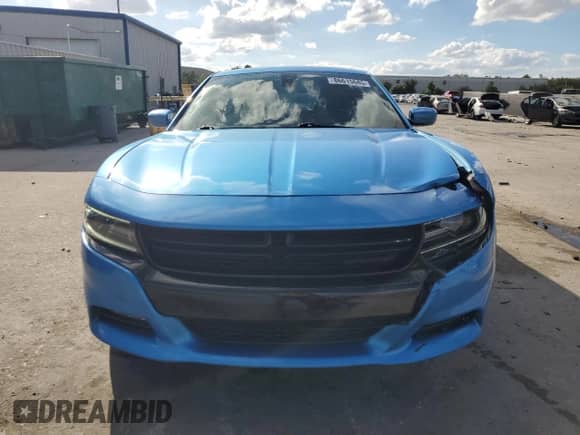 2015 Dodge Charger SXT with VIN 2C3CDXHG7FH738155, listed as a Copart auction lot 86615685 with 116,300 mi miles and Salvage title. Bid and sale history available at DreamBid. Image 5.