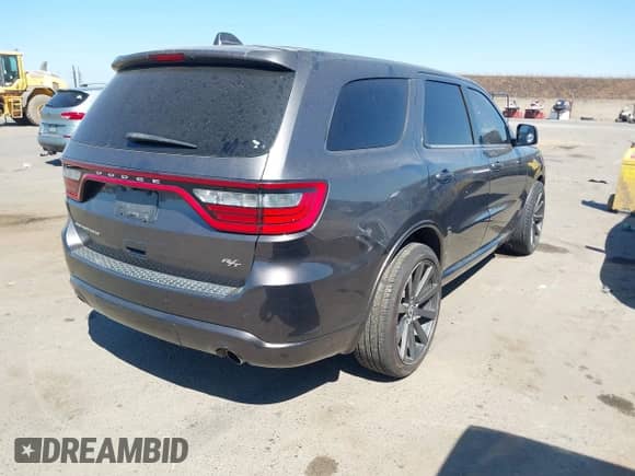 2015 Dodge Durango R/T with VIN 1C4SDHCT1FC695002, listed as a IAAI auction lot 43238005 with 136,303 mi miles and . Bid and sale history available at DreamBid. Image 4.