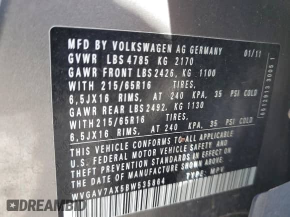 2011 Volkswagen Tiguan SE z VIN WVGAV7AX5BW535864, wystawiony jako Copart lot #49788565 z przebiegiem 175 298 mil mil oraz Czysty tytuł • Clean title. Historia ofert i sprzedaży dostępna na DreamBid. Obrazek 13.