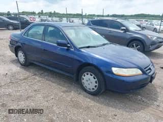 2001 Honda Accord LX with VIN JHMCG56481C005770, listed as a IAAI auction lot 42679889 with 219,186 mi miles and . Bid and sale history available at DreamBid. Image 1.