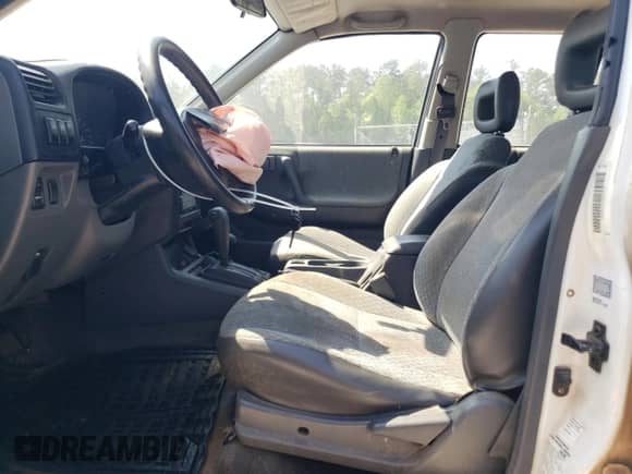 1999 Honda Passport LX с VIN 4S6CM58W7X4400988, выставлен на аукционе Copart как лот 53679805 с пробегом 188 345 миль миль и Списание • Salvage title. История ставок и продаж доступна на DreamBid. Изображение 7.