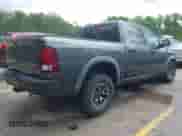 2015 Ram 1500 Rebel with VIN 1C6RR7YTXFS785507, listed as a IAAI auction lot 42172925 with 100,201 mi miles and . Bid and sale history available at DreamBid. Image 4.