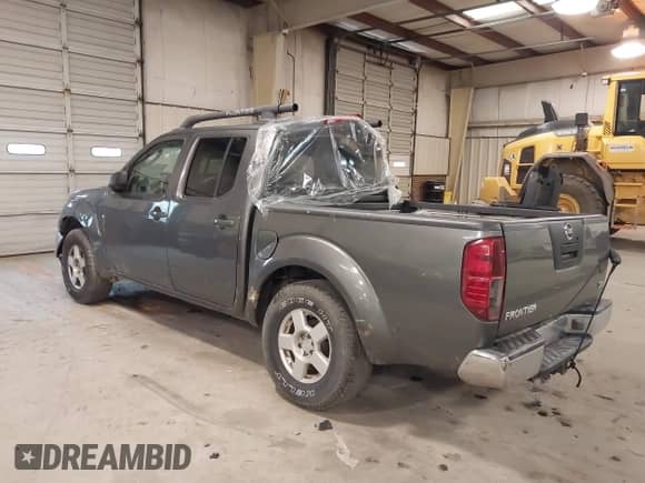 2006 Nissan Frontier LE with VIN 1N6AD07U76C414981, listed as a IAAI auction lot 41536352 with 217,560 mi miles and . Bid and sale history available at DreamBid. Image 3.