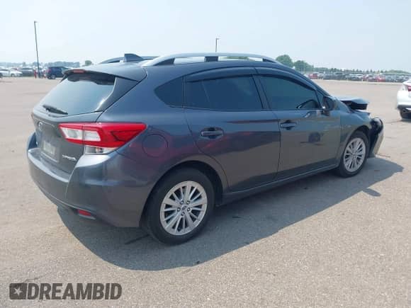 2018 Subaru Impreza Premium with VIN 4S3GTAB61J3726415, listed as a IAAI auction lot 42871763 with 115,023 mi miles and . Bid and sale history available at DreamBid. Image 4.