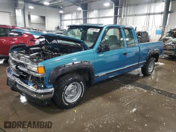 1997 Chevrolet Silverado 1500 with VIN 1GCEC19WXVE216345, listed as a Copart auction lot 82008794 with 167,116 mi miles and Salvage title. Bid and sale history available at DreamBid. Image 1.