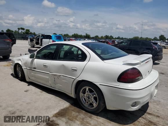 2002 Pontiac Grand Am GT z VIN 1G2NW52E62M603951, wystawiony jako Copart lot #65606355 z przebiegiem 76 254 mil mil oraz Szkoda całkowita • Salvage title. Historia ofert i sprzedaży dostępna na DreamBid. Obrazek 2.