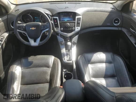 2014 Chevrolet Cruze 2LT z VIN 1G1PE5SB7E7134961, wystawiony jako Copart lot #80958165 z przebiegiem 154 313 mil mil oraz Szkoda całkowita • Salvage title. Historia ofert i sprzedaży dostępna na DreamBid. Obrazek 8.