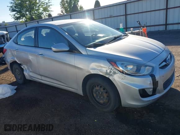 2014 Hyundai Accent GLS z VIN KMHCT4AE0EU620185, wystawiony jako IAAI lot #43359429 z przebiegiem 136 464 mil mil oraz . Historia ofert i sprzedaży dostępna na DreamBid. Obrazek 1.