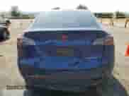 2023 Tesla Model Y Long Range with VIN 7SAYGDEE3PA152537, listed as a Copart auction lot 64859715 with Not provided miles and Salvage title. Bid and sale history available at DreamBid. Image 6.