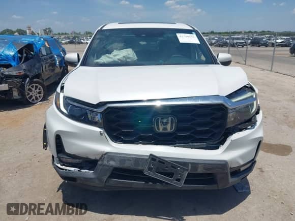 2025 Honda Passport EX-L with VIN 5FNYF8H55SB011791, listed as a IAAI auction lot 42749643 with 12,183 mi miles and . Bid and sale history available at DreamBid. Image 12.