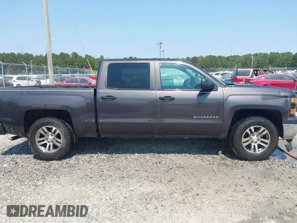 2014 Chevrolet Silverado 1500 LT z VIN 3GCPCREC7EG159985, wystawiony jako IAAI lot #43232438 z przebiegiem 392 327 mil mil oraz . Historia ofert i sprzedaży dostępna na DreamBid. Obrazek 13.