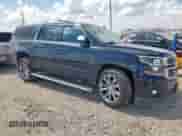 2015 Chevrolet Suburban LTZ z VIN 1GNSKKKC8FR165831, wystawiony jako Copart lot #81661365 z przebiegiem Nie podano mil oraz Czysty tytuł • Clean title. Historia ofert i sprzedaży dostępna na DreamBid. Obrazek 4.