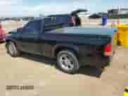 1999 Dodge Dakota SLT with VIN 1B7GL26Z9XS278840, listed as a Copart auction lot 65640885 with 62,454 mi miles and Salvage title. Bid and sale history available at DreamBid. Image 2.