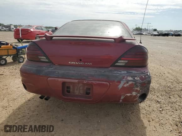 2004 Pontiac Grand Am SE with VIN 1G2NE52F44M563674, listed as a Copart auction lot 56692715 with 197,843 mi miles and Salvage title. Bid and sale history available at DreamBid. Image 6.