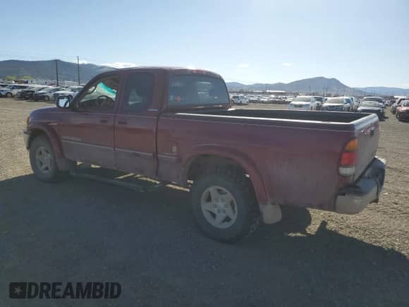 2001 Toyota Tundra Limited z VIN 5TBBT48181S165094, wystawiony jako Copart lot #55515765 z przebiegiem 264 859 mil mil oraz Czysty tytuł • Clean title. Historia ofert i sprzedaży dostępna na DreamBid. Obrazek 2.