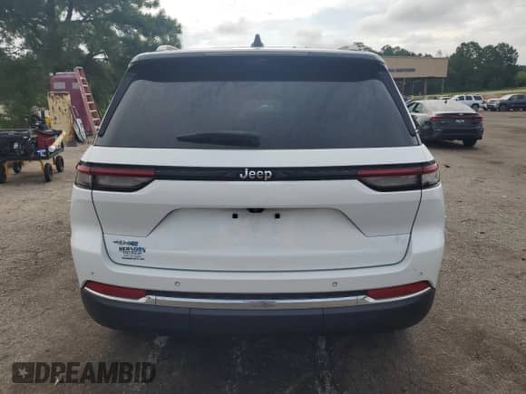 2023 Jeep Grand Cherokee with VIN 1C4RJYB65P8786894, listed as a Copart auction lot 66939075 with 23,572 mi miles and Salvage title. Bid and sale history available at DreamBid. Image 6.