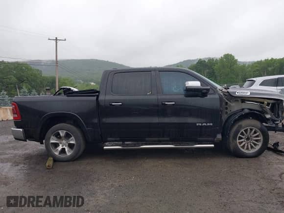 2019 Ram 1500 Laramie with VIN 1C6RREJT3KN502713, listed as a IAAI auction lot 42509778 with 83,837 mi miles and . Bid and sale history available at DreamBid. Image 14.