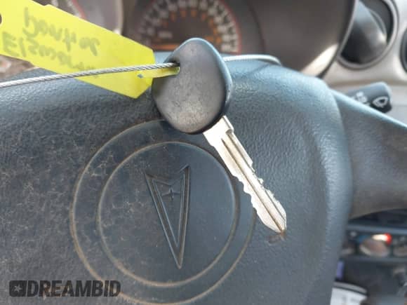 2004 Pontiac Grand Am SE1 z VIN 1G2NF52E64M507479, wystawiony jako IAAI lot #43375815 z przebiegiem 215 524 mil mil oraz . Historia ofert i sprzedaży dostępna na DreamBid. Obrazek 11.