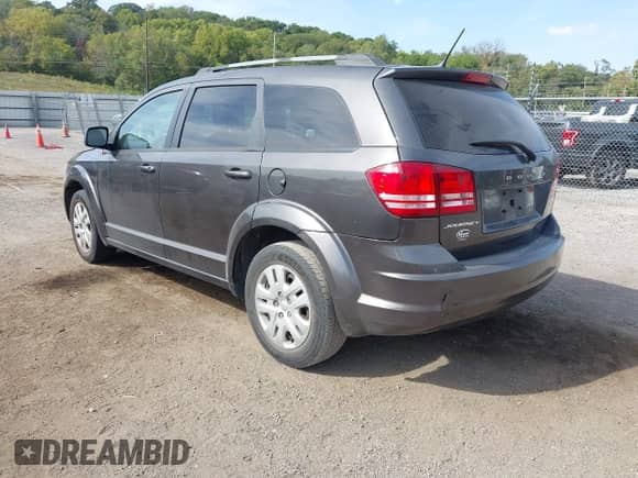 2017 Dodge Journey SE with VIN 3C4PDCABXHT560045, listed as a IAAI auction lot 43332641 with 159,859 mi miles and . Bid and sale history available at DreamBid. Image 3.