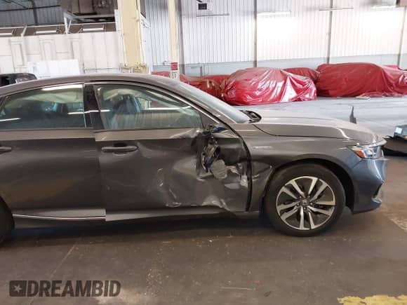 2021 Honda Accord EX-L z VIN 1HGCV3F55MA013847, wystawiony jako IAAI lot #42729914 z przebiegiem 46 573 mil mil oraz . Historia ofert i sprzedaży dostępna na DreamBid. Obrazek 13.