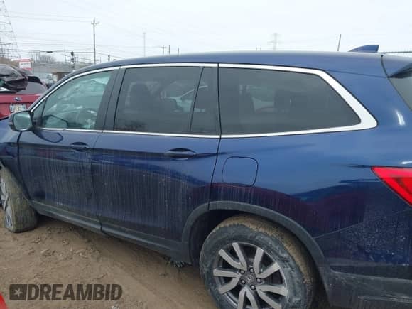 2022 Honda Pilot EX-L with VIN 5FNYF6H53NB010082, listed as a IAAI auction lot 41605798 with 52,733 mi miles and . Bid and sale history available at DreamBid. Image 14.