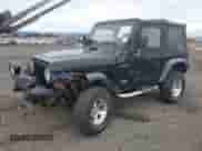 1998 Jeep Wrangler SE z VIN 1J4FY29P6WP765254, wystawiony jako IAAI lot #43342210 z przebiegiem 128 384 mil mil oraz . Historia ofert i sprzedaży dostępna na DreamBid. Obrazek 2.