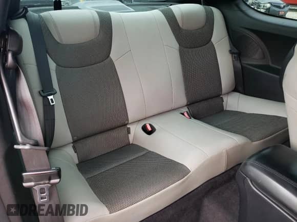 2013 Hyundai Genesis Coupe 2.0T z VIN KMHHT6KD7DU092148, wystawiony jako Copart lot #71086844 z przebiegiem 97 755 mil mil oraz Szkoda całkowita • Salvage title. Historia ofert i sprzedaży dostępna na DreamBid. Obrazek 10.