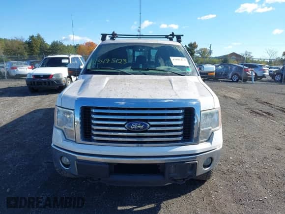 2011 Ford F-150 XLT z VIN 1FTFW1ET2BFA69936, wystawiony jako IAAI lot #43495123 z przebiegiem 244 899 mil mil oraz . Historia ofert i sprzedaży dostępna na DreamBid. Obrazek 12.