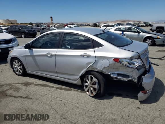 2014 Hyundai Accent GLS z VIN KMHCU4AEXEU624371, wystawiony jako Copart lot #66858945 z przebiegiem 199 501 mil mil oraz Szkoda całkowita • Salvage title. Historia ofert i sprzedaży dostępna na DreamBid. Obrazek 2.