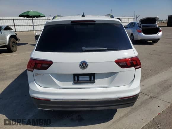 2020 Volkswagen Tiguan SE с VIN 3VV3B7AX8LM168869, выставлен на аукционе Copart как лот 71452045 с пробегом 75 639 миль миль и Списание • Salvage title. История ставок и продаж доступна на DreamBid. Изображение 6.