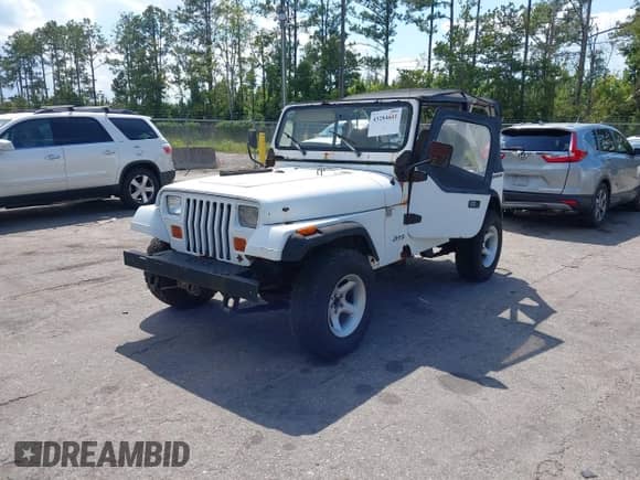 1991 Jeep Wrangler with VIN 2J4FY19P3MJ117746, listed as a IAAI auction lot 43284641 with 151,796 mi miles and . Bid and sale history available at DreamBid. Image 2.