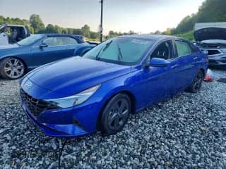 2021 Hyundai Elantra SEL с VIN KMHLM4AG7MU129352, выставлен на аукционе Copart как лот 64328765 с пробегом Не указан миль и Списание • Salvage title. История ставок и продаж доступна на DreamBid. Изображение 1.