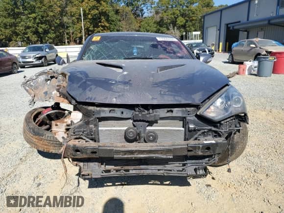 2015 Hyundai Genesis Coupe R-Spec with VIN KMHHU6KJ5FU122785, listed as a Copart auction lot 77006244 with Not provided miles and Salvage title. Bid and sale history available at DreamBid. Image 5.