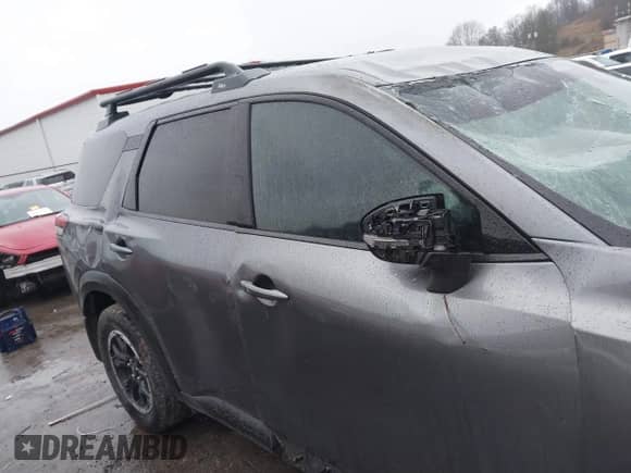 2023 Nissan Pathfinder Rock Creek with VIN 5N1DR3BD8PC275189, listed as a IAAI auction lot 41039839 with 50,058 mi miles and . Bid and sale history available at DreamBid. Image 12.