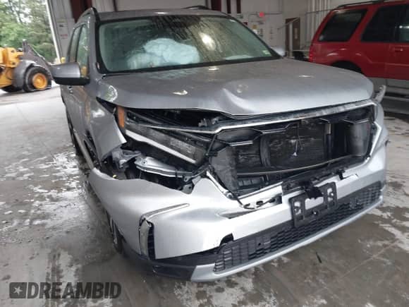 2023 Honda Pilot Elite z VIN 5FNYG1H88PB017705, wystawiony jako IAAI lot #42326303 z przebiegiem 23 725 mil mil oraz . Historia ofert i sprzedaży dostępna na DreamBid. Obrazek 6.