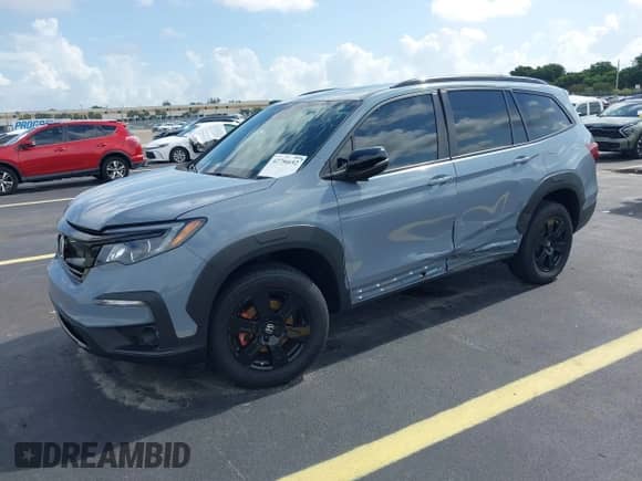 2022 Honda Pilot TrailSport with VIN 5FNYF6H85NB100828, listed as a IAAI auction lot 42756692 with 100,388 mi miles and . Bid and sale history available at DreamBid. Image 17.