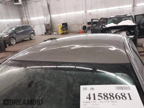 1998 Saturn SL with VIN 1G8ZH528XWZ240574, listed as a IAAI auction lot 41588681 with Not provided miles and . Bid and sale history available at DreamBid. Image 12.