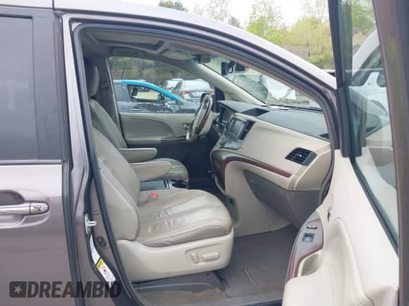 2012 Toyota Sienna XLE with VIN 5TDDK3DC2CS043855, listed as a IAAI auction lot 42189680 with 195,788 mi miles and . Bid and sale history available at DreamBid. Image 5.