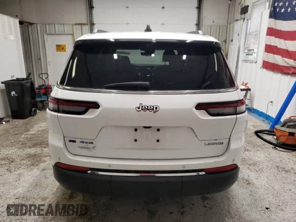 2023 Jeep Grand Cherokee Limited with VIN 1C4RJKBGXP8805588, listed as a Copart auction lot 59855945 with 57,984 mi miles and Clean title. Bid and sale history available at DreamBid. Image 6.
