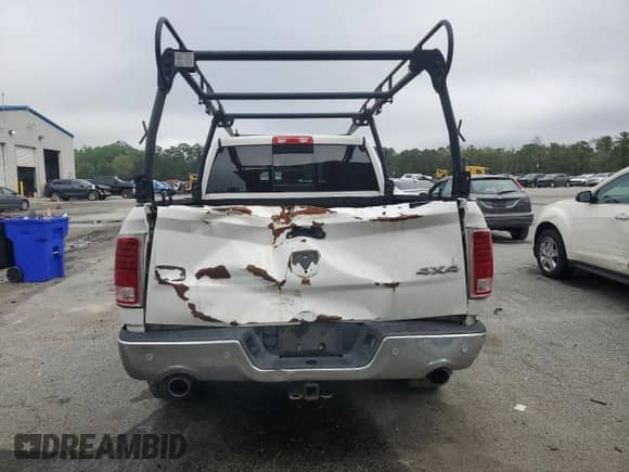 2015 Ram 1500 Laramie Limited with VIN 1C6RR7WM9FS761064, listed as a Copart auction lot 50032335 with 212,141 mi miles and Salvage title. Bid and sale history available at DreamBid. Image 6.