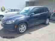 2013 Volkswagen Tiguan SE z VIN WVGAV3AX1DW560501, wystawiony jako IAAI lot #42287579 z przebiegiem 180 367 mil mil oraz . Historia ofert i sprzedaży dostępna na DreamBid. Obrazek 2.