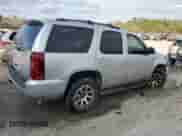 2012 Chevrolet Tahoe LS with VIN 1GNSCAE01CR232256, listed as a Copart auction lot 43985175 with 148,223 mi miles and Salvage title. Bid and sale history available at DreamBid. Image 3.