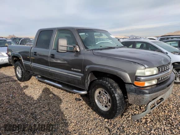 2002 Chevrolet Silverado 1500HD LT с VIN 1GCGK13U02F217612, выставлен на аукционе Copart как лот 47384975 с пробегом 198 138 миль миль и Списание • Salvage title. История ставок и продаж доступна на DreamBid. Изображение 4.