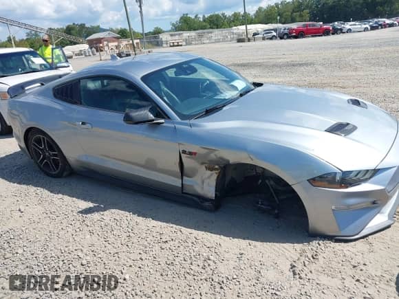2023 Ford Mustang EcoBoost with VIN 1FA6P8TH8P5104941, listed as a IAAI auction lot 43214980 with 66,194 mi miles and . Bid and sale history available at DreamBid. Image 1.
