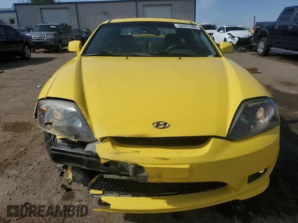 2005 Hyundai Tiburon GT z VIN KMHHN65F75U170498, wystawiony jako Copart lot #58391985 z przebiegiem 190 374 mil mil oraz Szkoda całkowita • Salvage title. Historia ofert i sprzedaży dostępna na DreamBid. Obrazek 5.