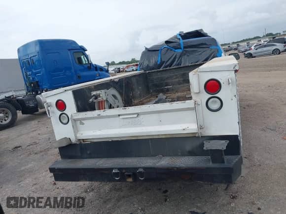 2003 Chevrolet Silverado 2500HD LS with VIN 1GCHC29113E249478, listed as a IAAI auction lot 42145187 with 580,776 mi miles and . Bid and sale history available at DreamBid. Image 16.