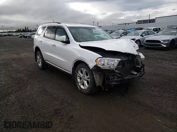 2013 Dodge Durango Crew with VIN 1C4RDJDG9DC554196, listed as a Copart auction lot 80313895 with 104,486 mi miles and Salvage title. Bid and sale history available at DreamBid. Image 14.